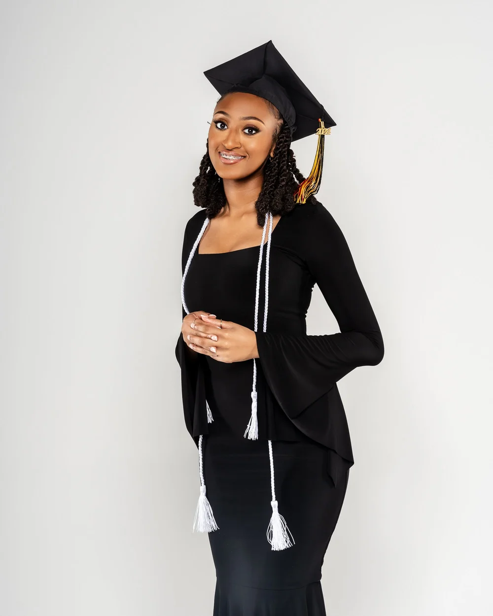Senior portrait in black on location