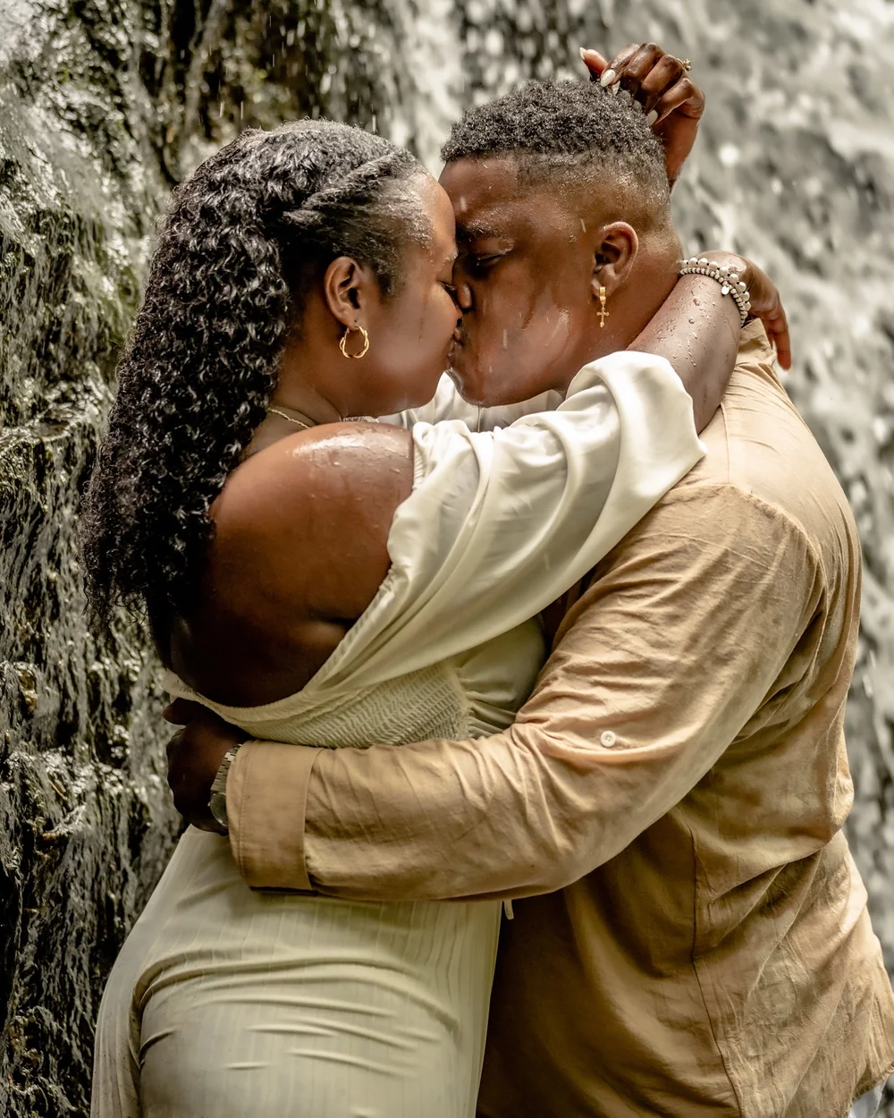 Couple embracing at golden hour during an engagement session