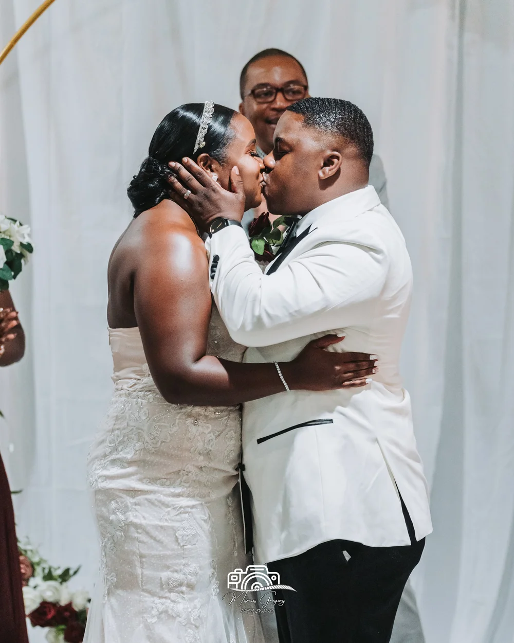 Bride and groom embracing during their Baltimore wedding reception