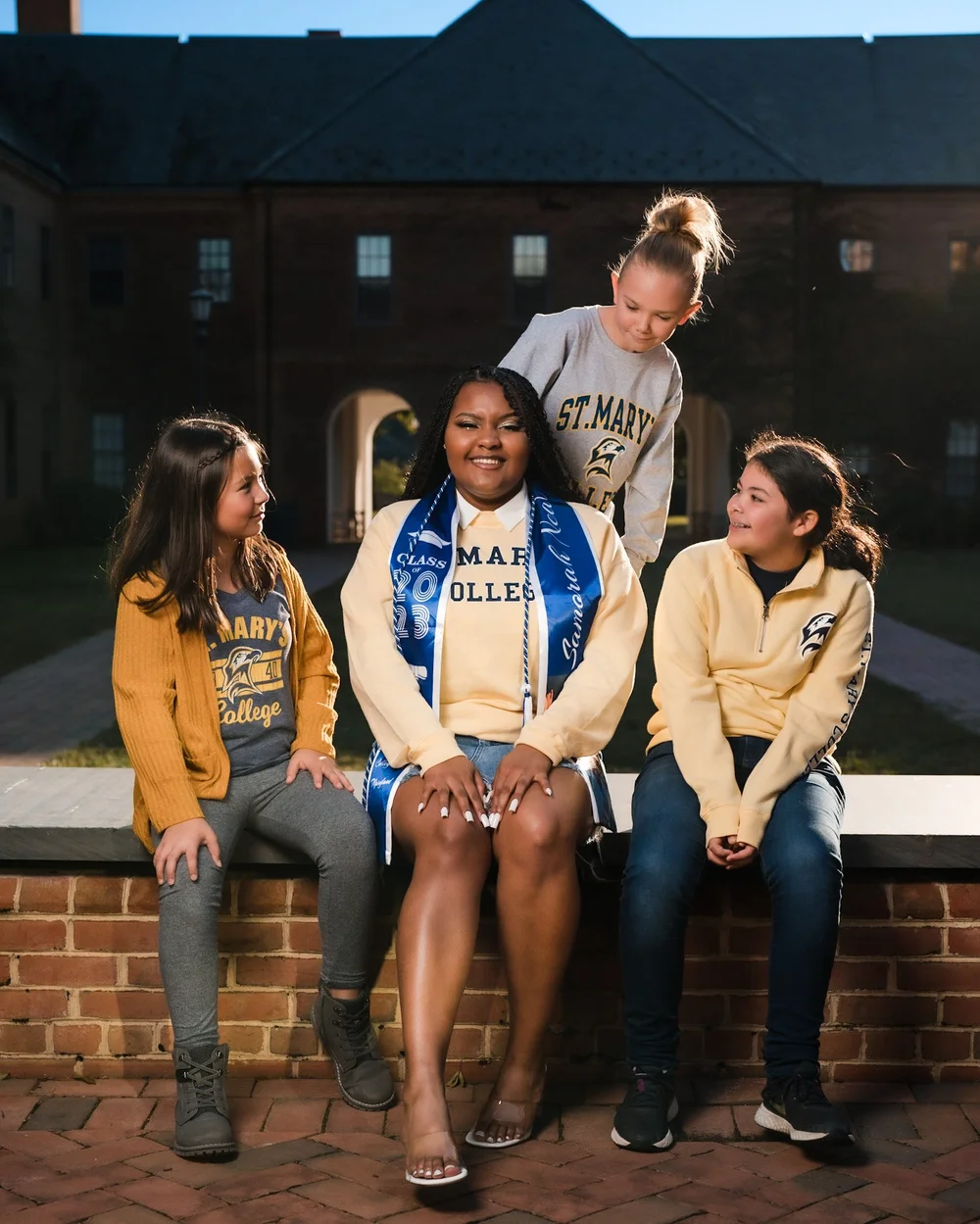 Group of graduates photographed on campus