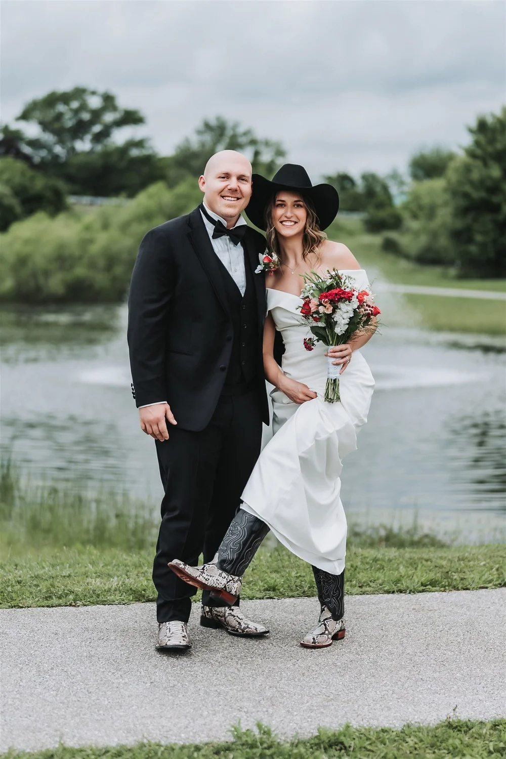 Groom in a black tuxedo with his bride outdoors in Maryland