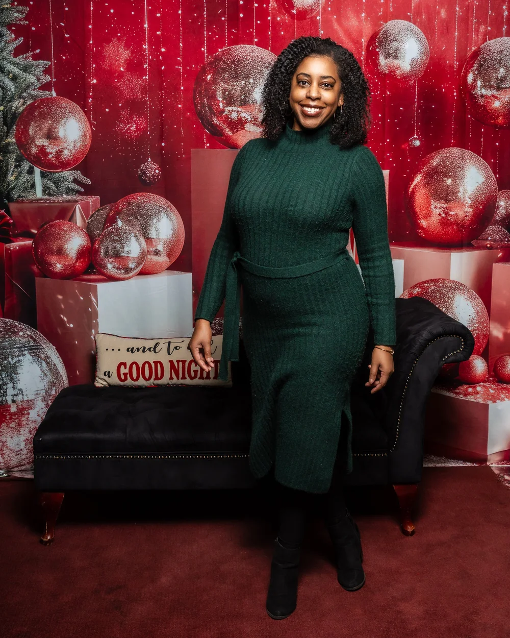 Holiday studio portrait in an emerald green dress