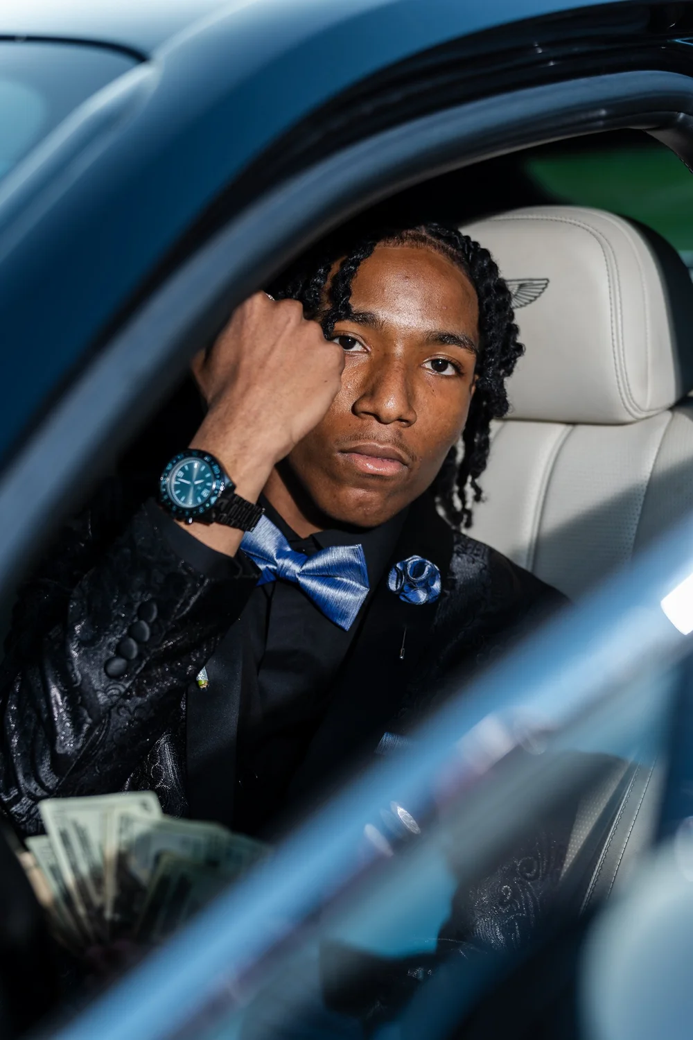 Prom portrait of a young man in a patterned jacket