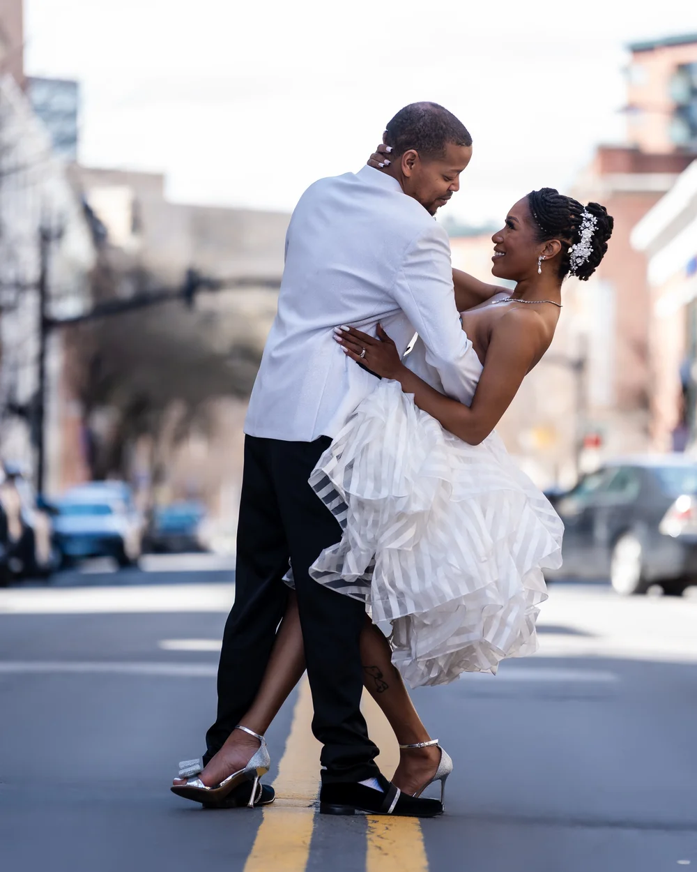 Engagement portrait of a couple in white, Maryland