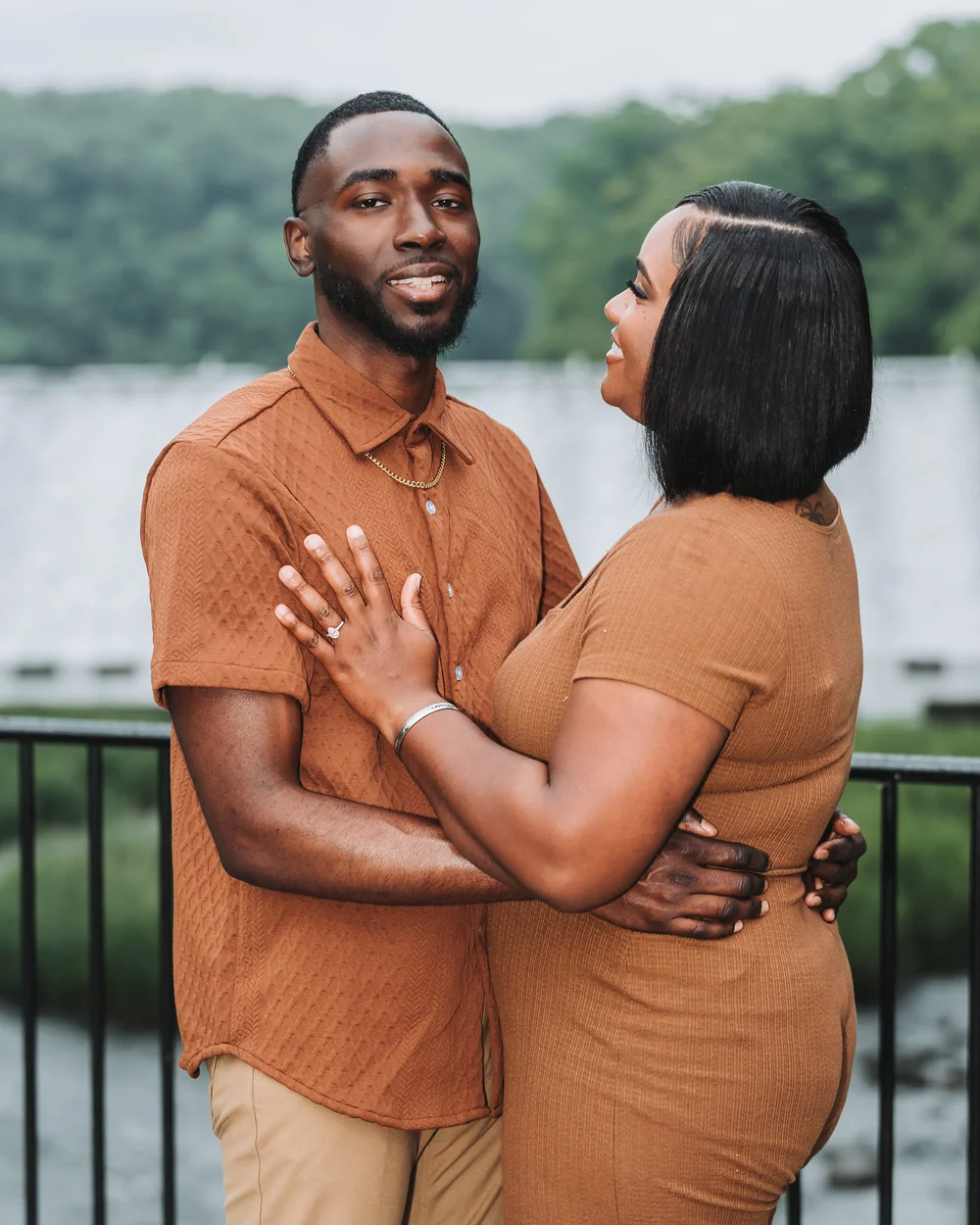 Engagement portrait of a couple in warm tones
