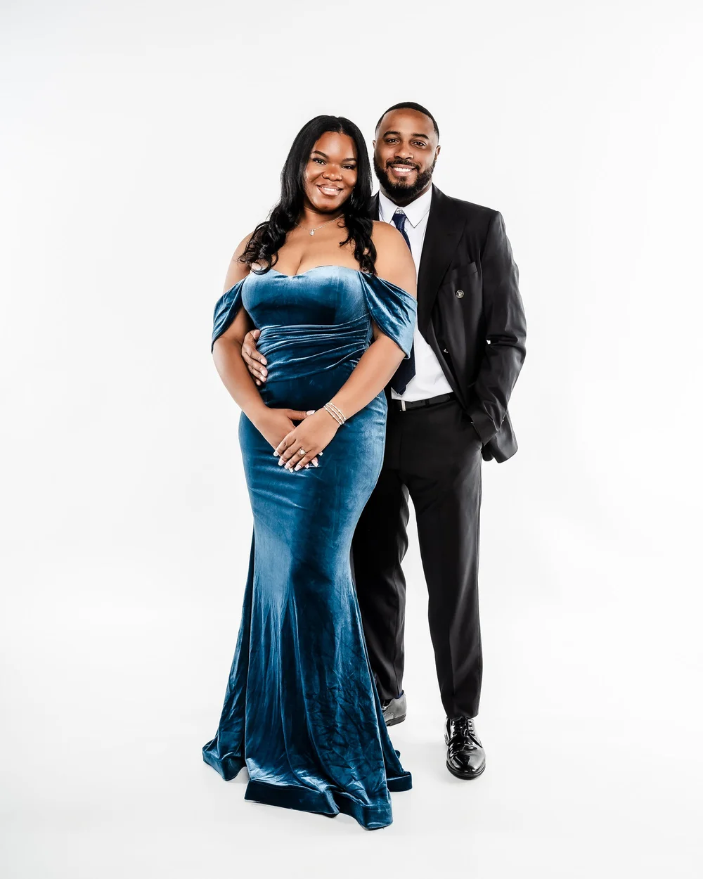 Engagement portrait of a couple in denim and black