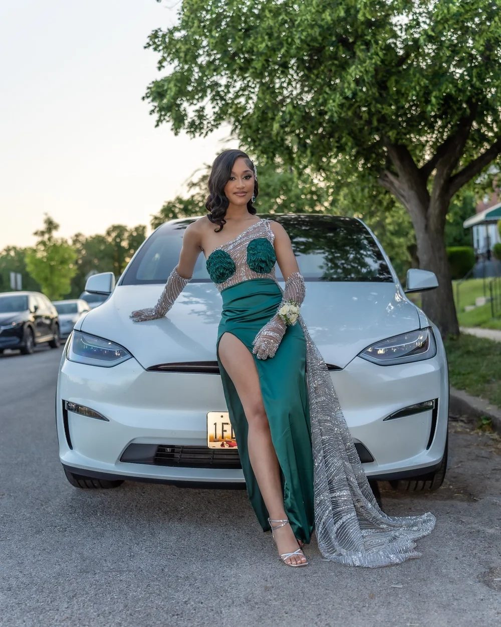 Prom portrait posed on a white car at a Maryland sendoff