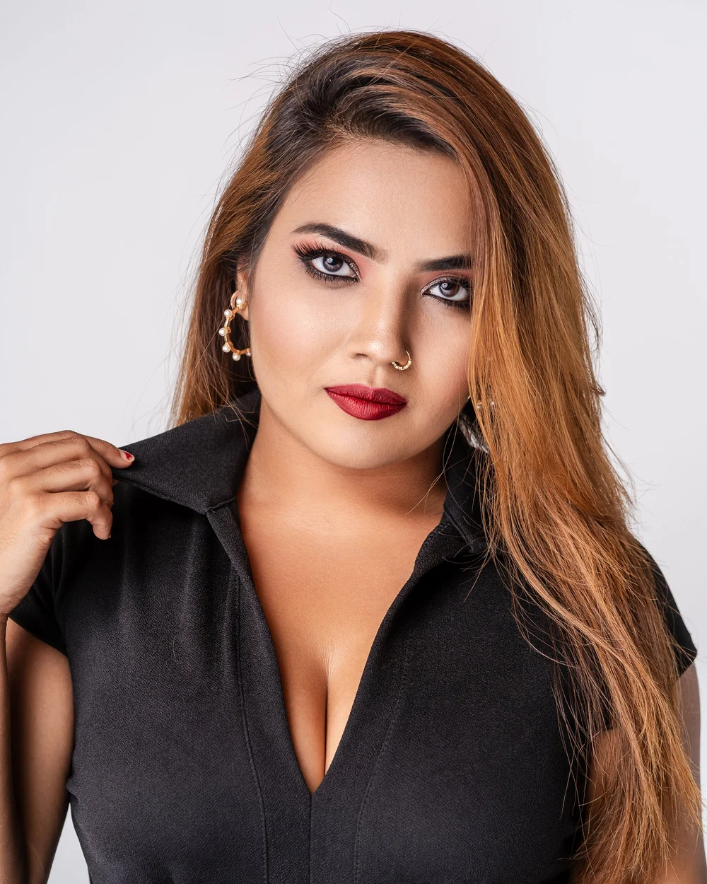 Studio beauty portrait in soft blush lighting