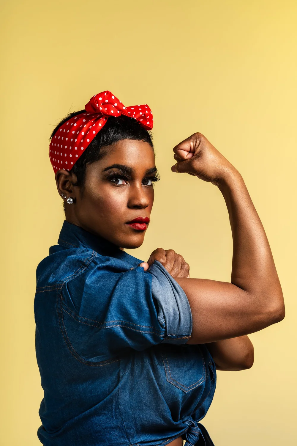 Creative studio portrait with boxing gloves