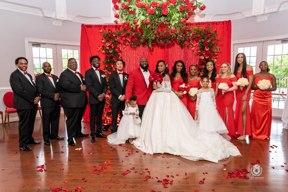 Bridal party portrait at a red-themed Baltimore wedding