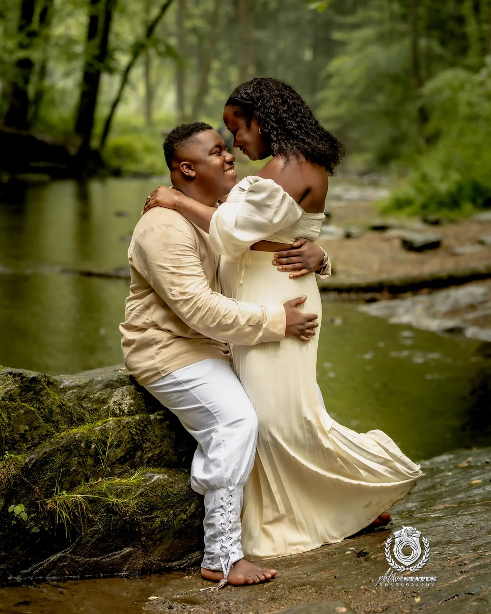 Couple in cream and white at an outdoor engagement session