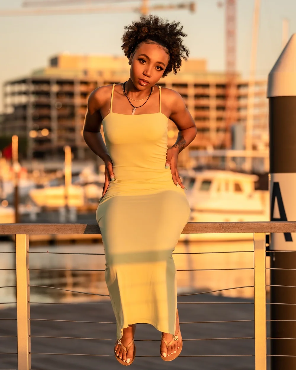 On-location portrait in a yellow dress