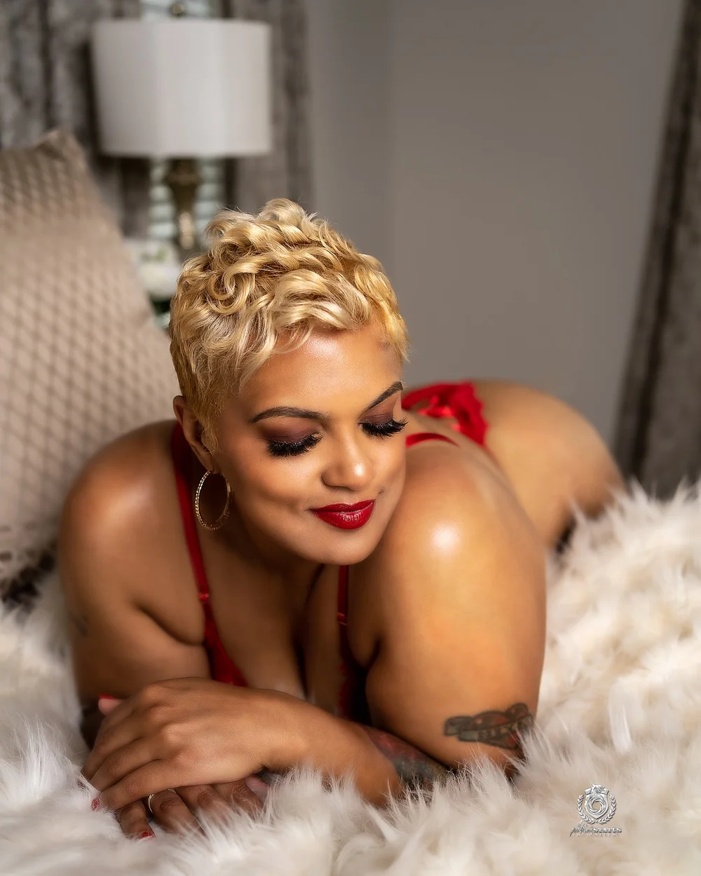 Woman with a blonde pixie cut in a boudoir photography portrait, by Marcus Gregory Photography