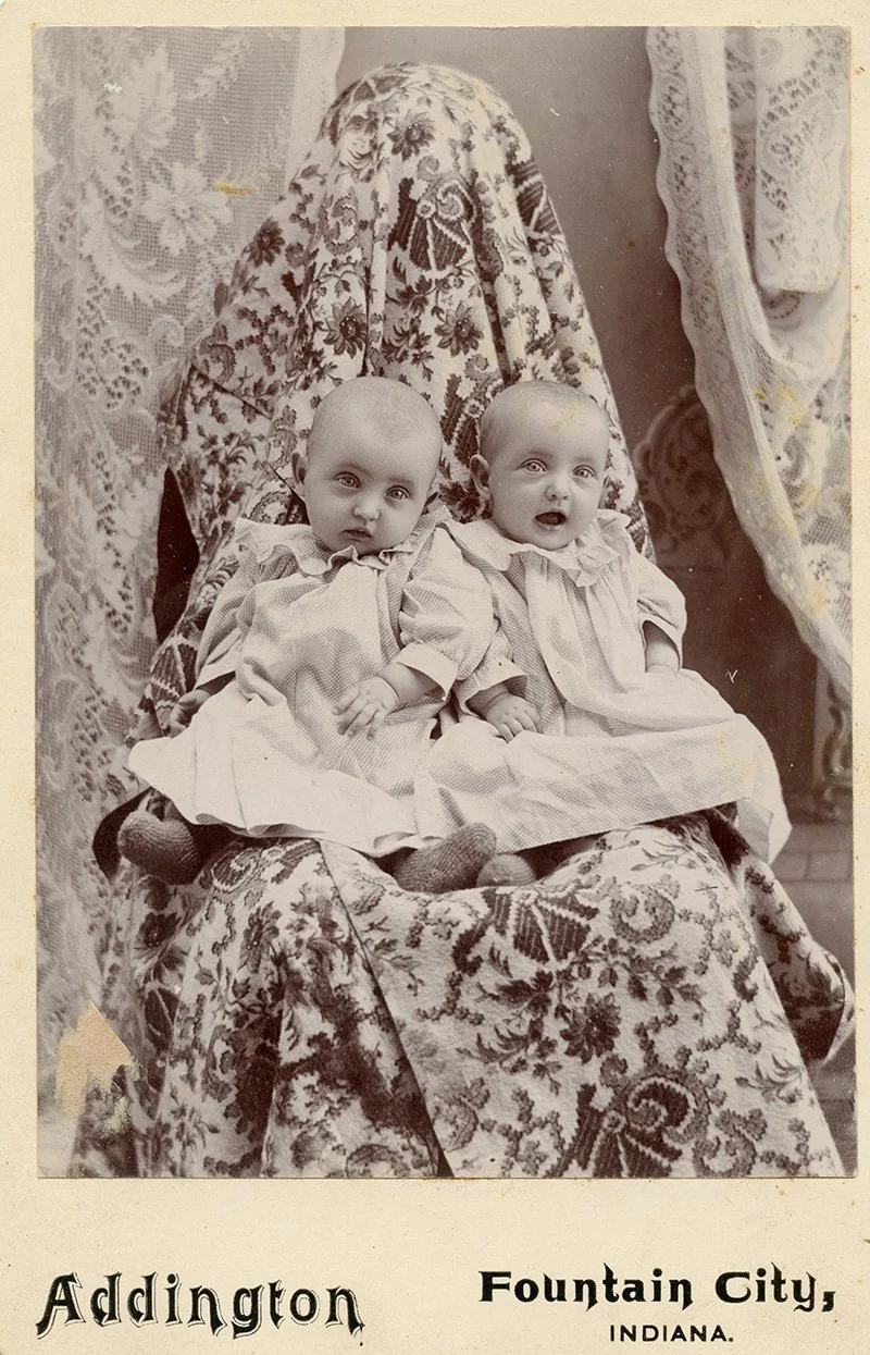 Leora and Leota Lamb, twins from Fountain City, Indiana, on their mother’s lap, 1897. Image courtesy of the Indiana Album