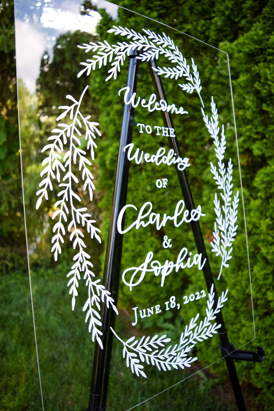 acrylic wedding welcome sign with greenery