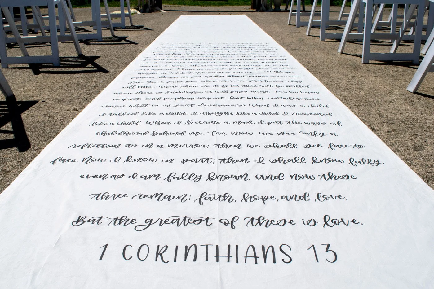 Hand lettered aisle runner for wedding ceremony