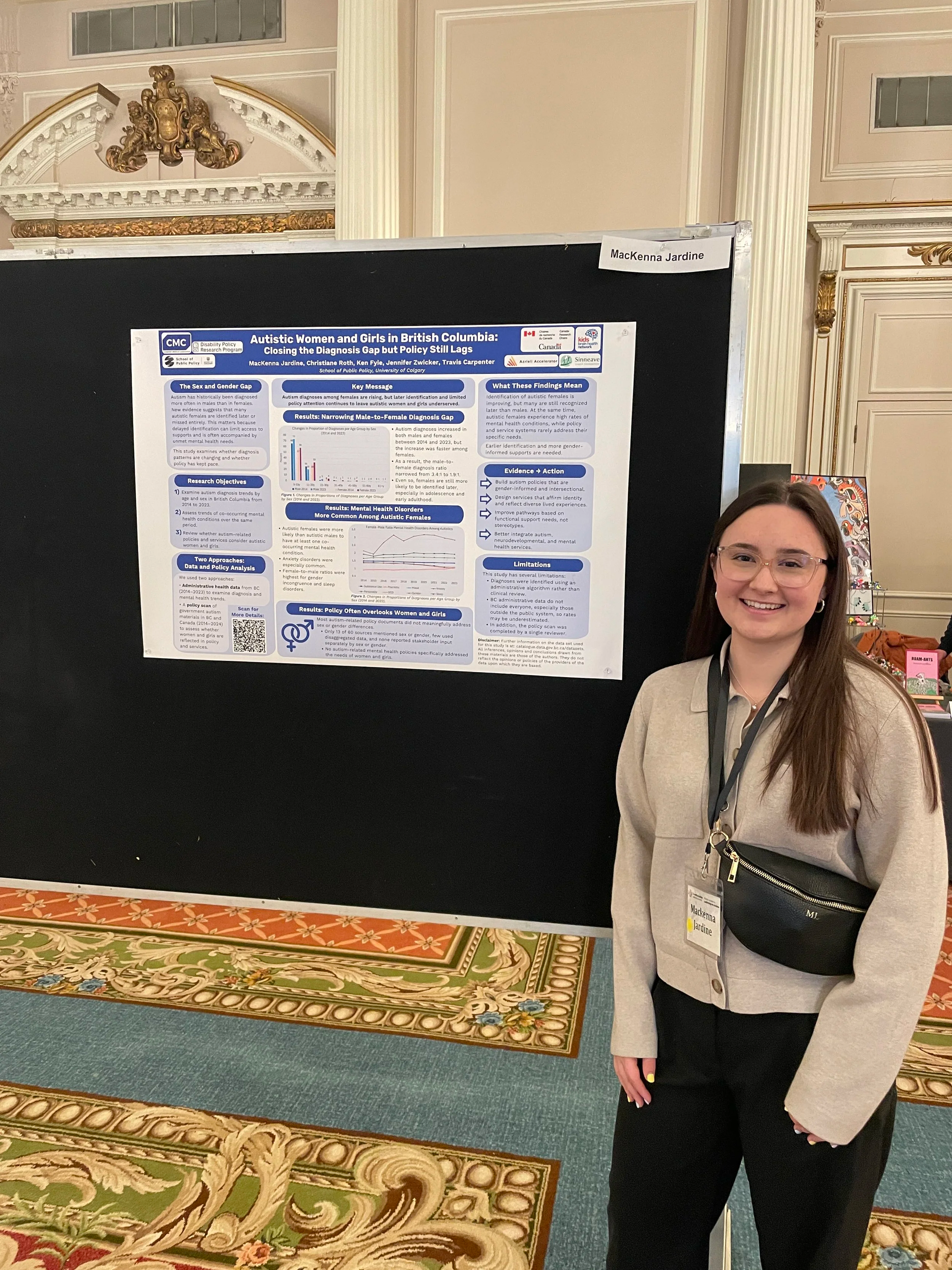 MacKenna during her poster presentation at CALS