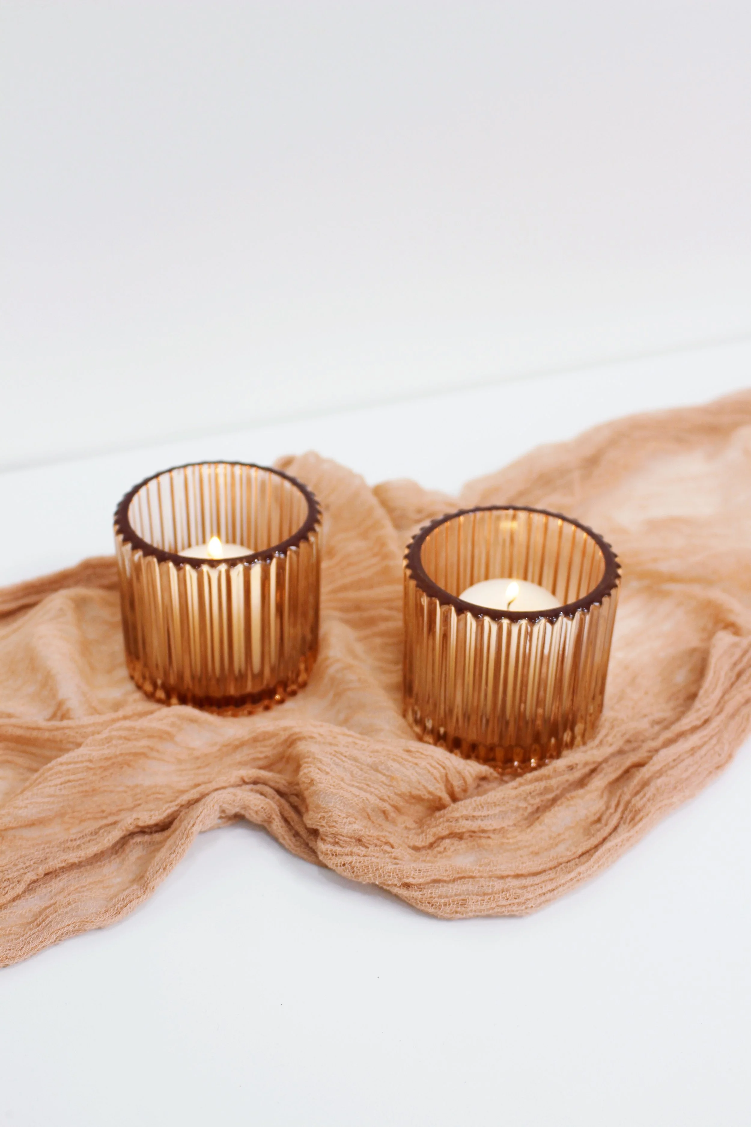 rose blush ribbed glass votive candle holders