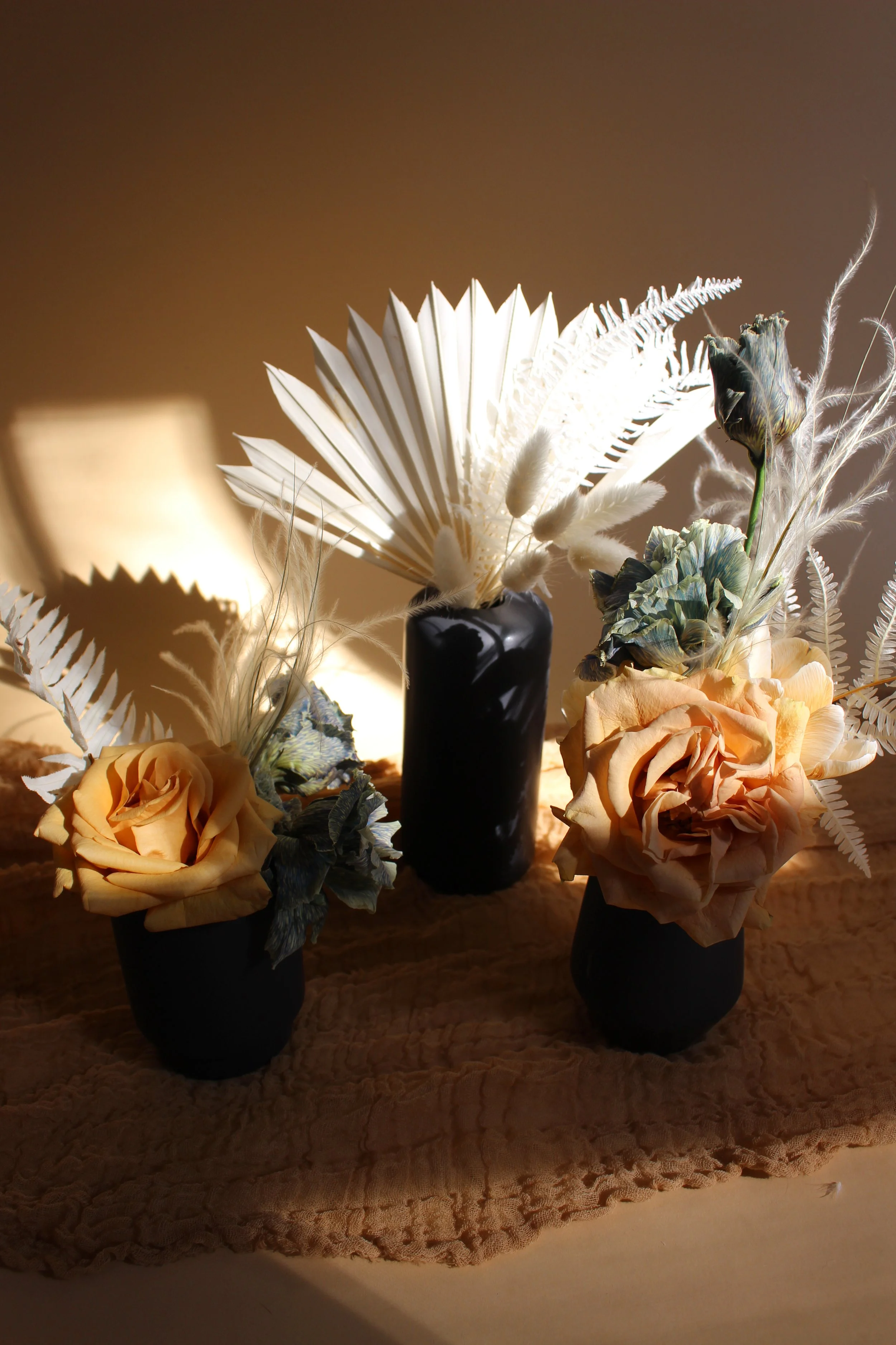 black ceramic bud vases
