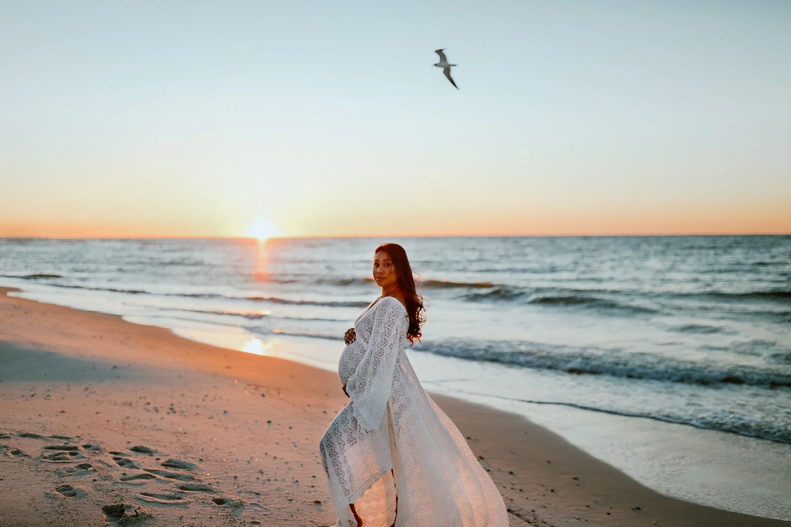 Maternity portrait on the beach at sunset in Gulf Shores, Alabama