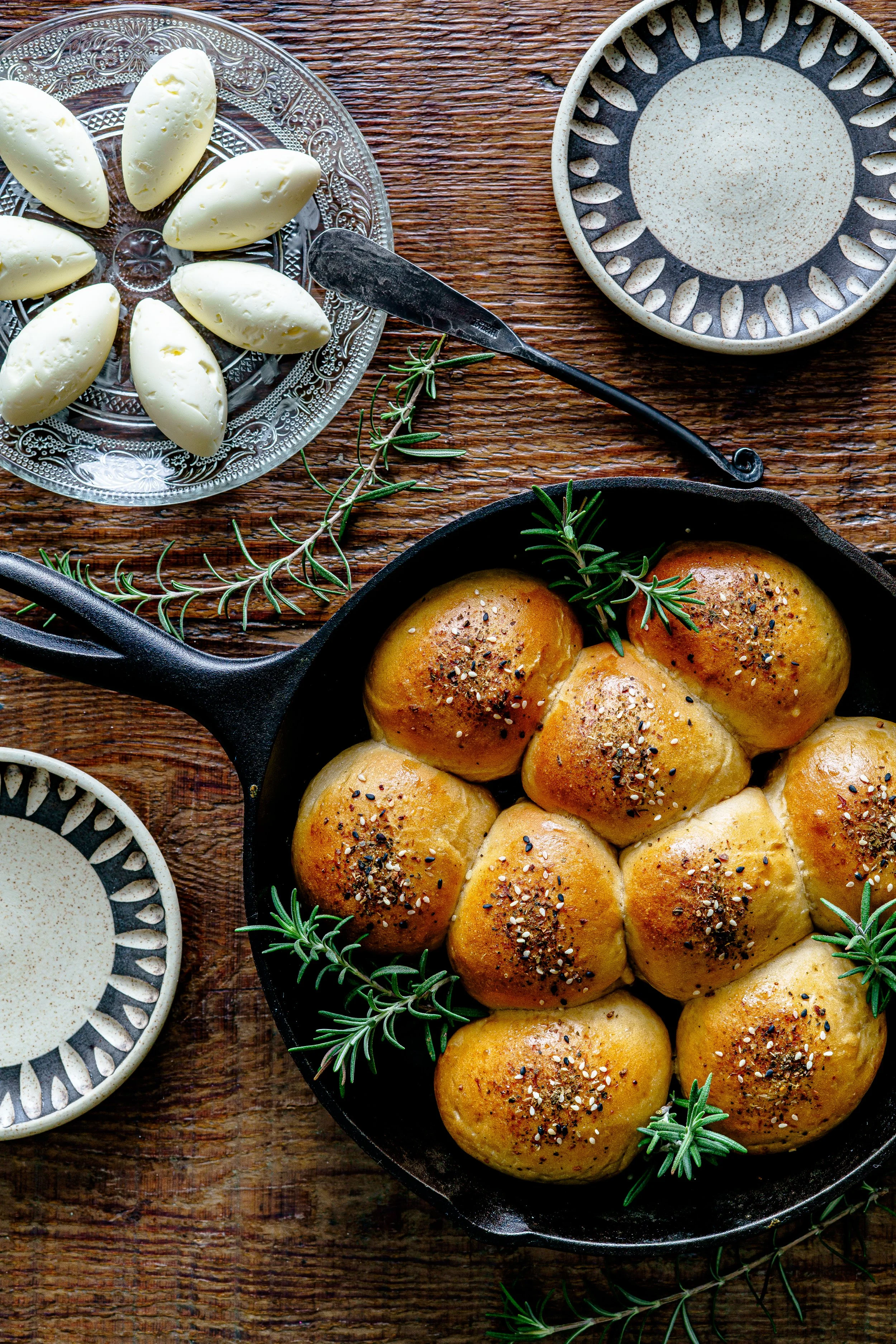 Parker House Rolls with Sesame Seeds and Koji Butter. Using Organic Butler's Gold Flour from Barton Springs Mill in Dripping Springs, TX. Photograph by Cameron Kisel for Daffodil Culinary and Catering in Austin Texas and surrounding areas.