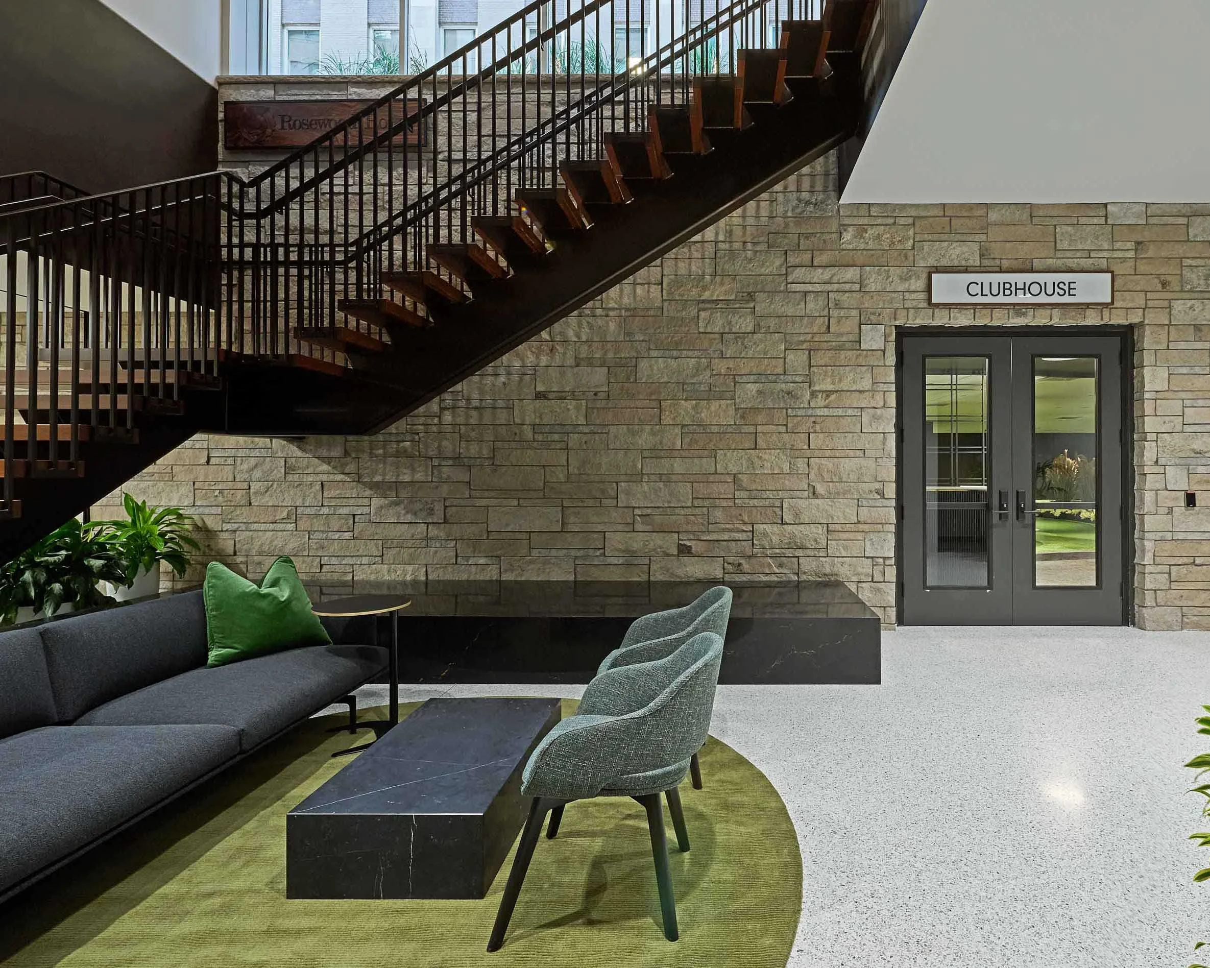 Industrial-style lobby at Northstar Center with staircase.