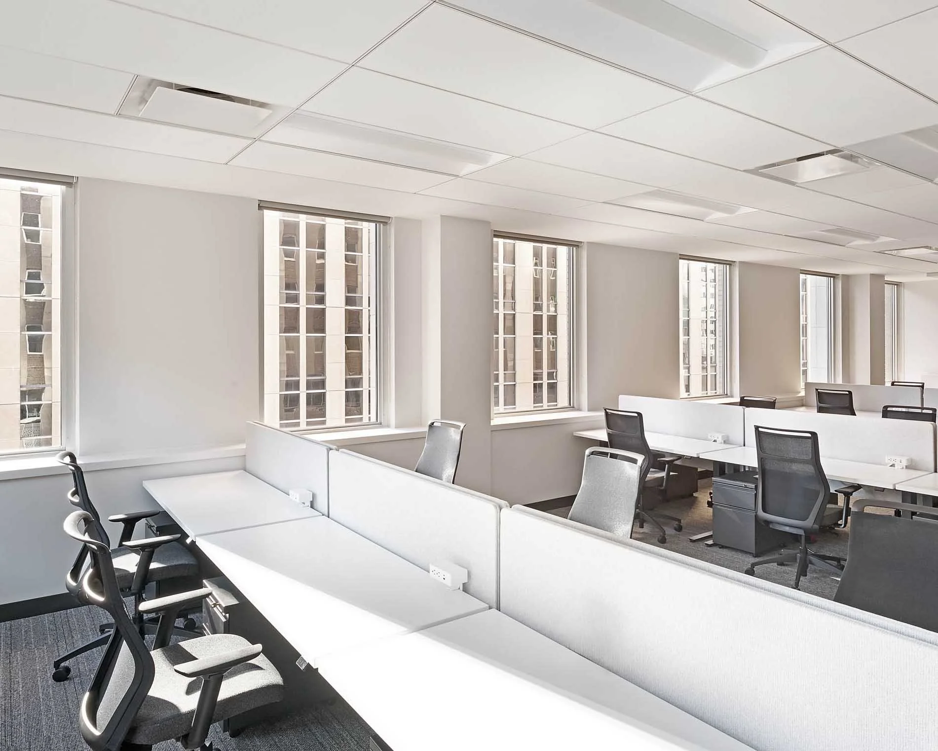 Bright coworking area with open desks at Northstar Center.