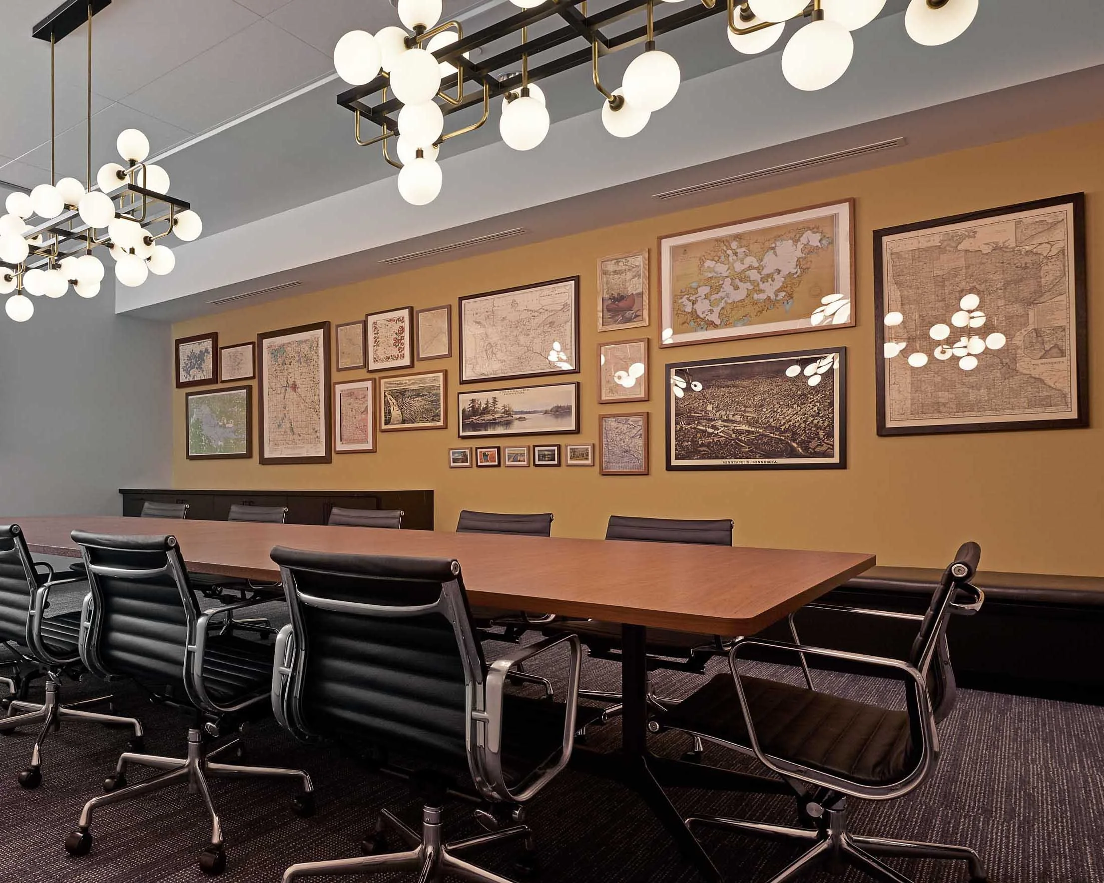 Boardroom with artwork and black chairs at Northstar Center.
