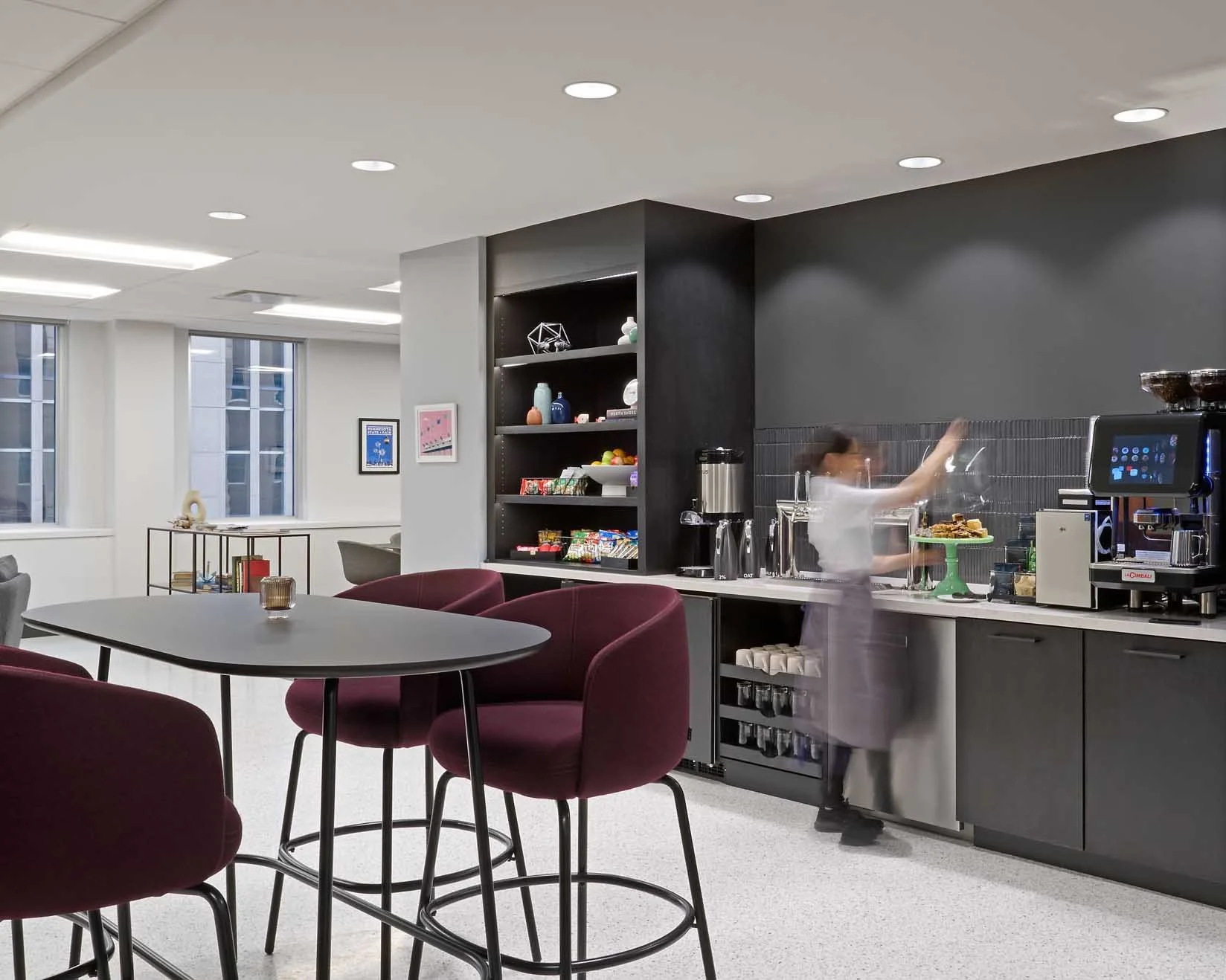 Office break area with bar seating at Northstar Center.