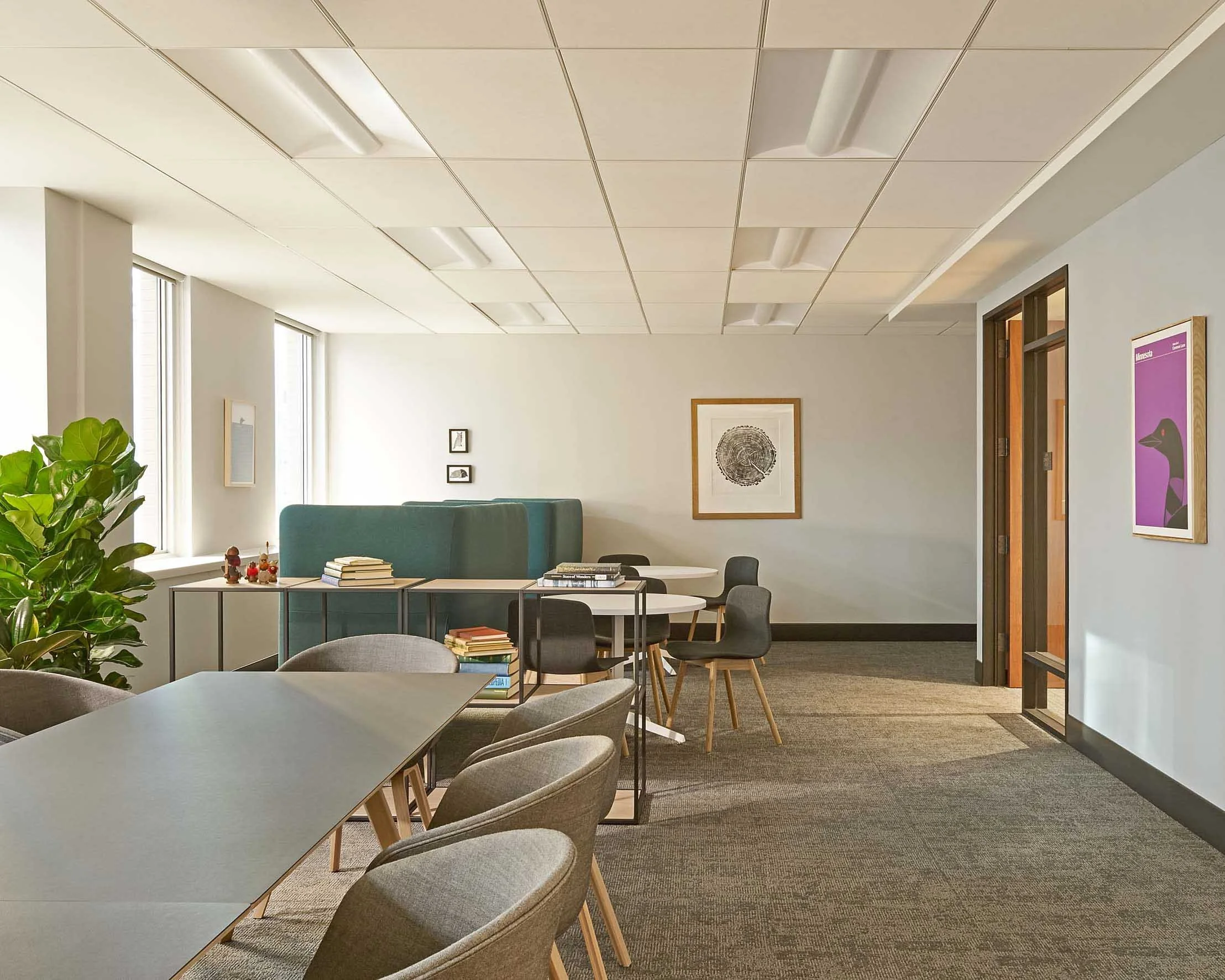 Private furnished workspace at Northstar Center with seating and decor.