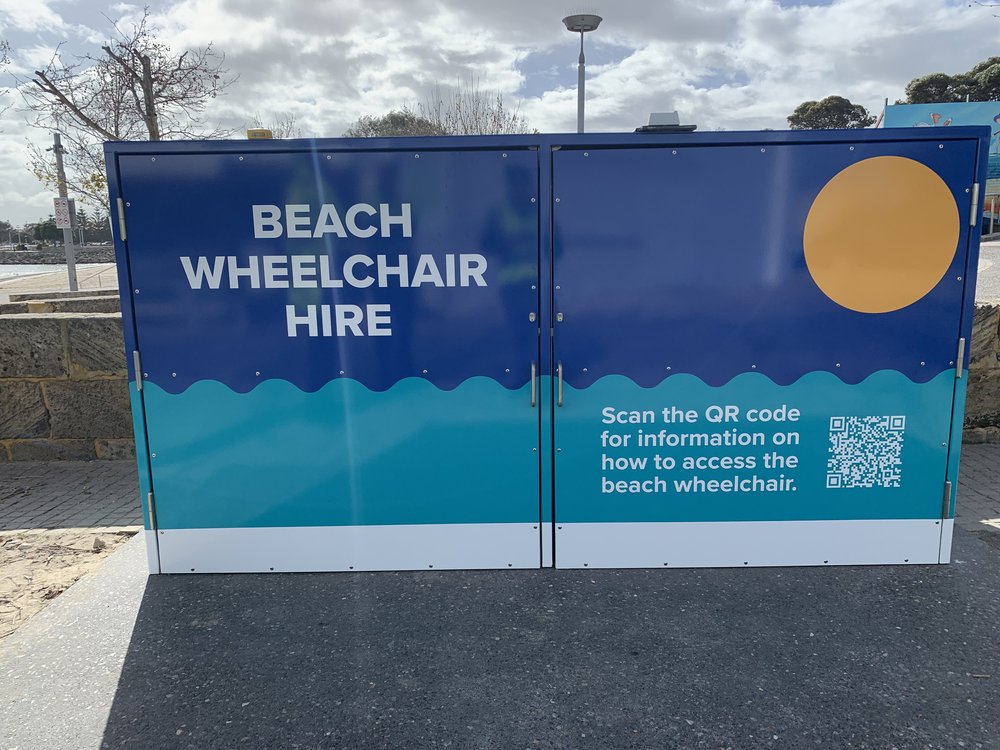 Beach wheelchair locker signage.JPG