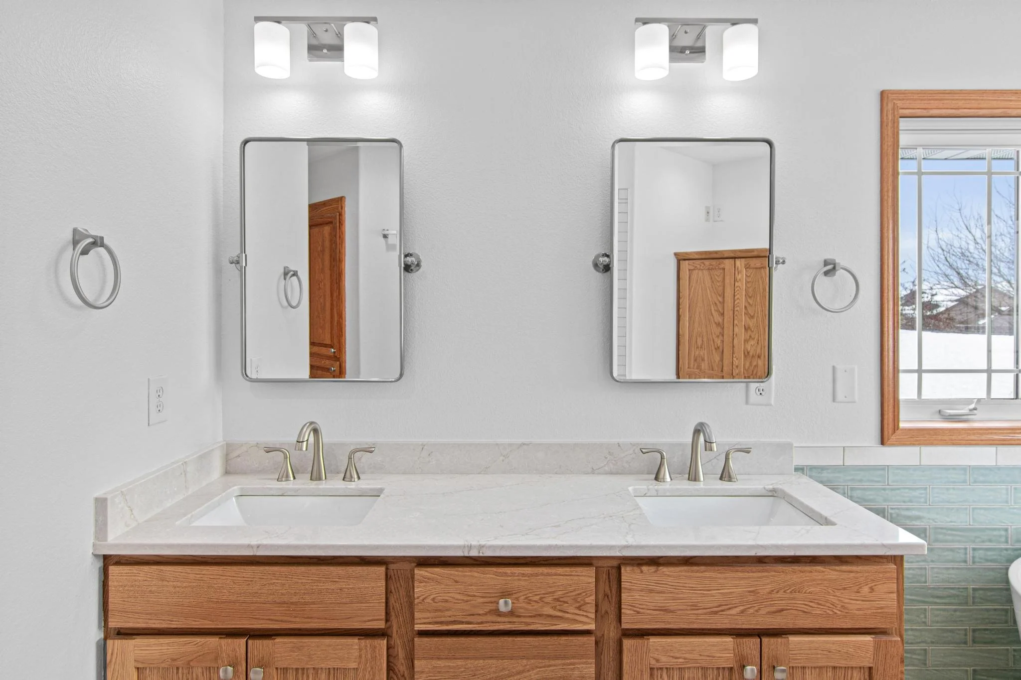 Master bathroom remodel custom cabinetry quartz countertops