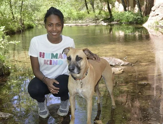 Women and dog hiking