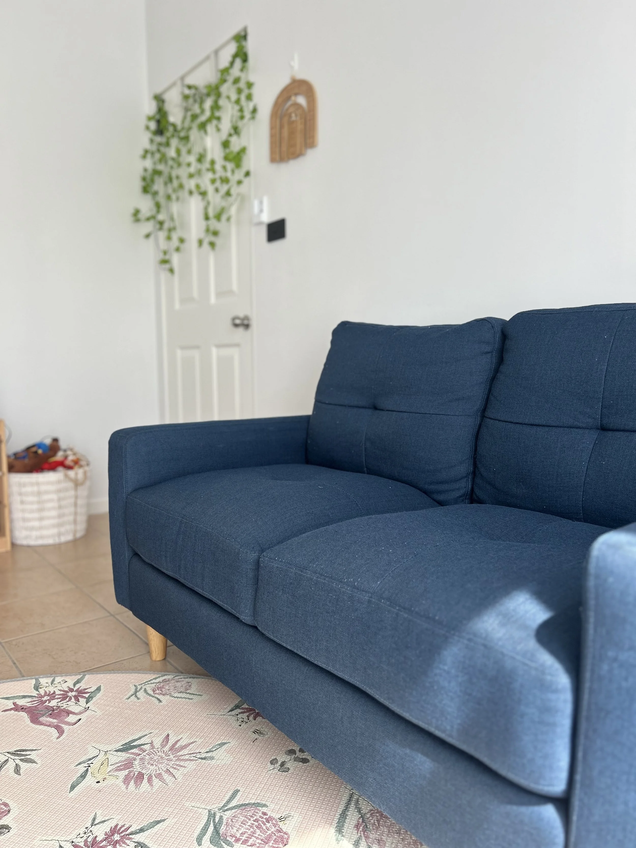 Blue couch in a counselling room