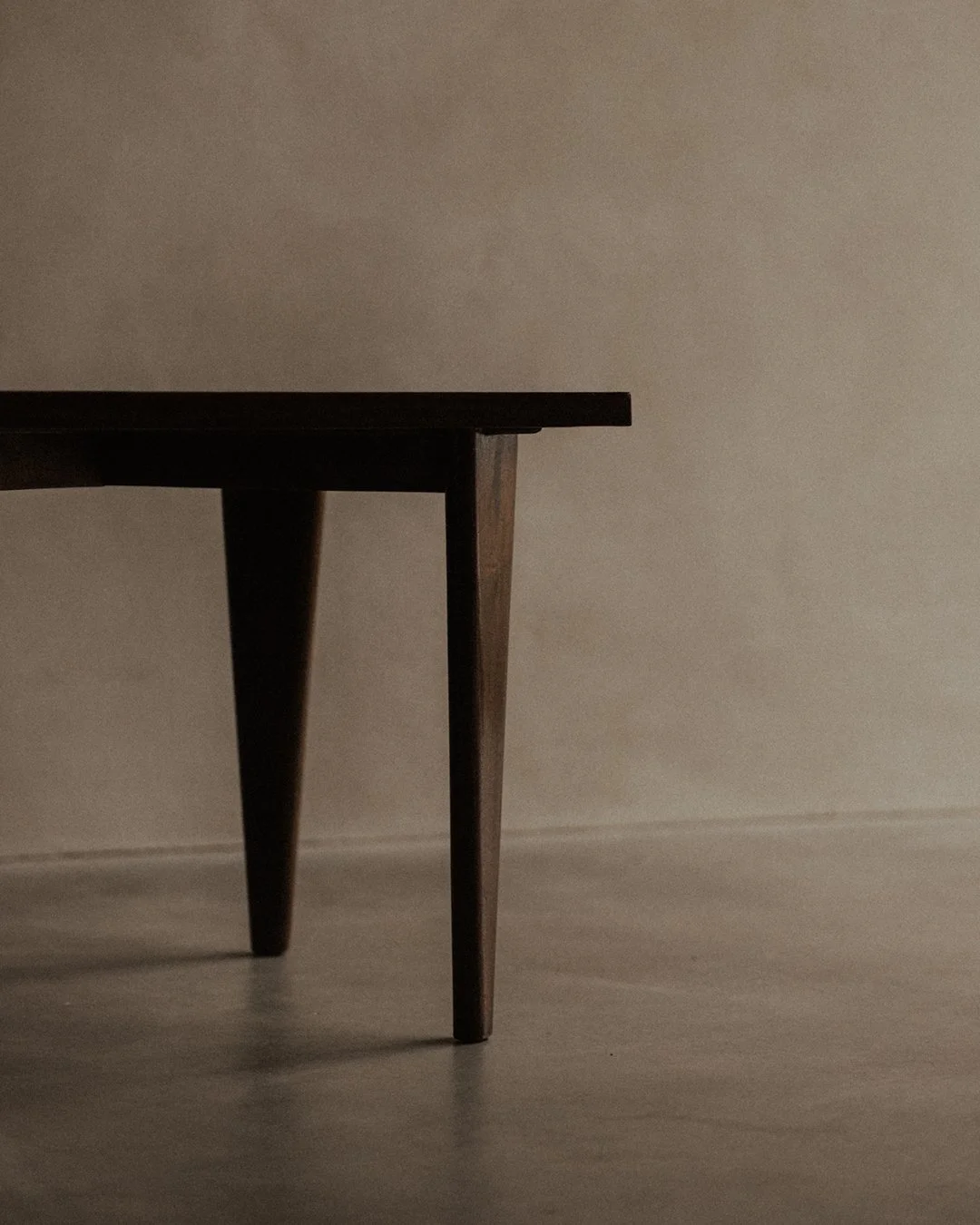 Pierre Jeanneret PJ‑TA‑04‑A square cafeteria/dining table, solid teak with brown lacquered veneer, thick square top, tapered vertical legs, mid-century Chandigarh design, circa 1955, restored