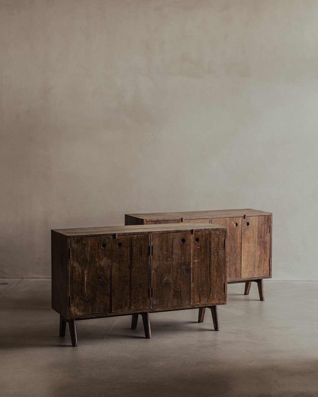 PJ-R-14-A storage unit by Pierre Jeanneret, c. 1857–58. Teak or sisso wood low cupboard with four aluminum-backed grip doors - Chandigarh Punjab