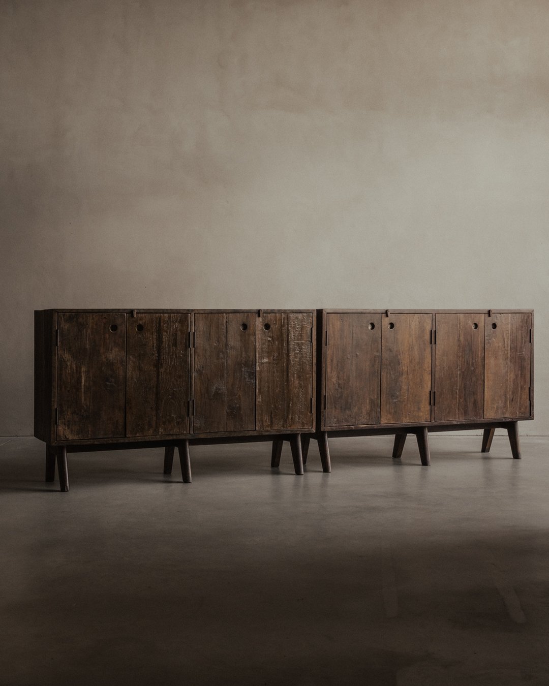 PJ-R-14-A storage unit by Pierre Jeanneret, c. 1857–58. Teak or sisso wood low cupboard with four aluminum-backed grip doors - Chandigarh Punjab