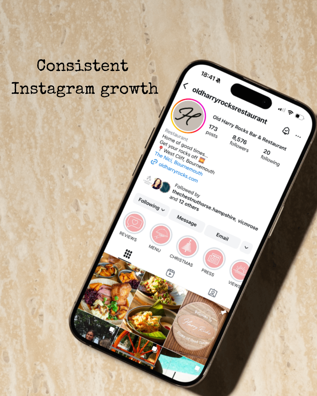 A smartphone displaying an Instagram profile of Old Harry Rocks Bar & Restaurant with photos of food and drinks, and the text "Consistent Instagram growth" on a beige textured surface.