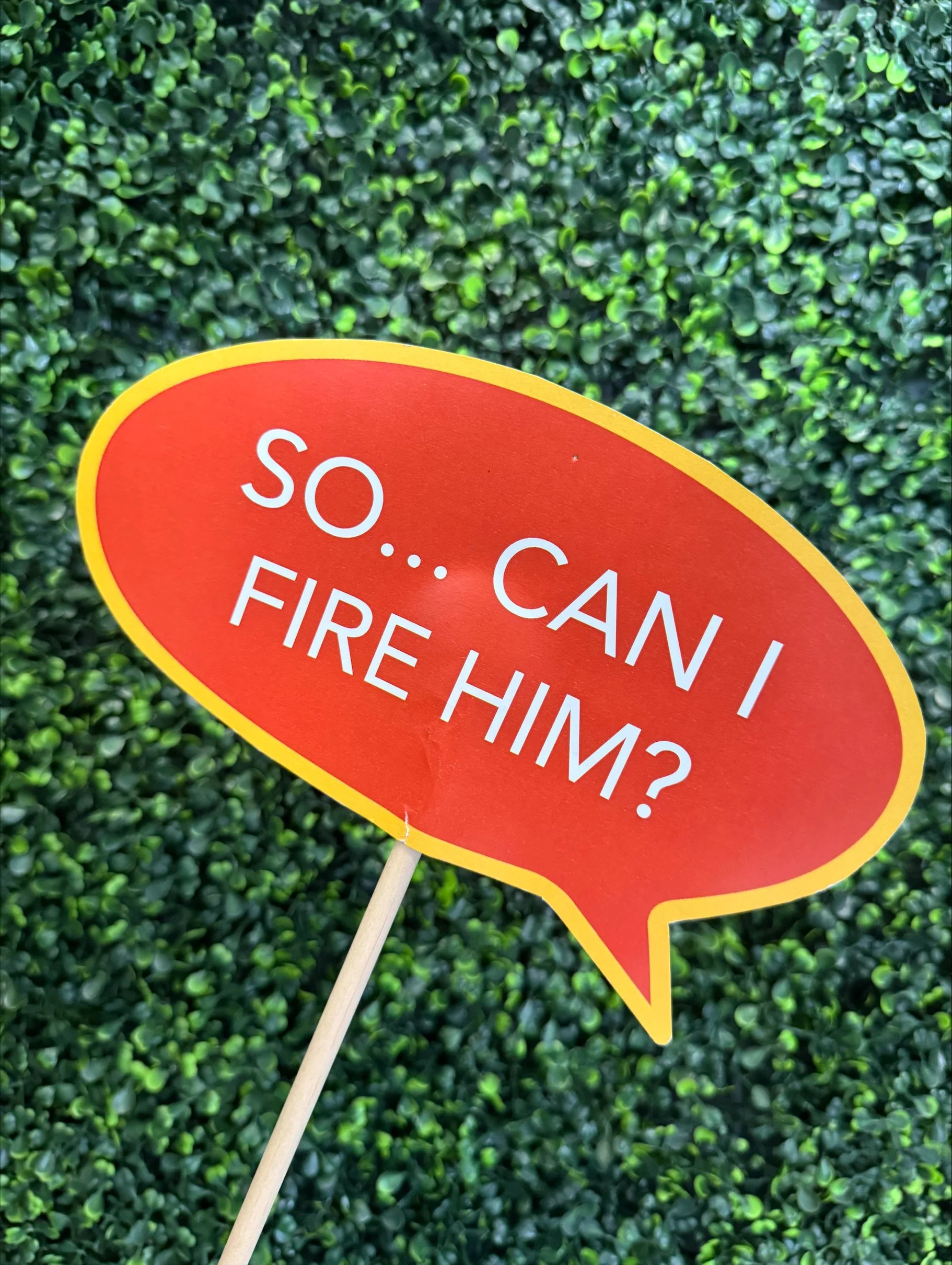 Pop art banner saying "so... can I fire him?"