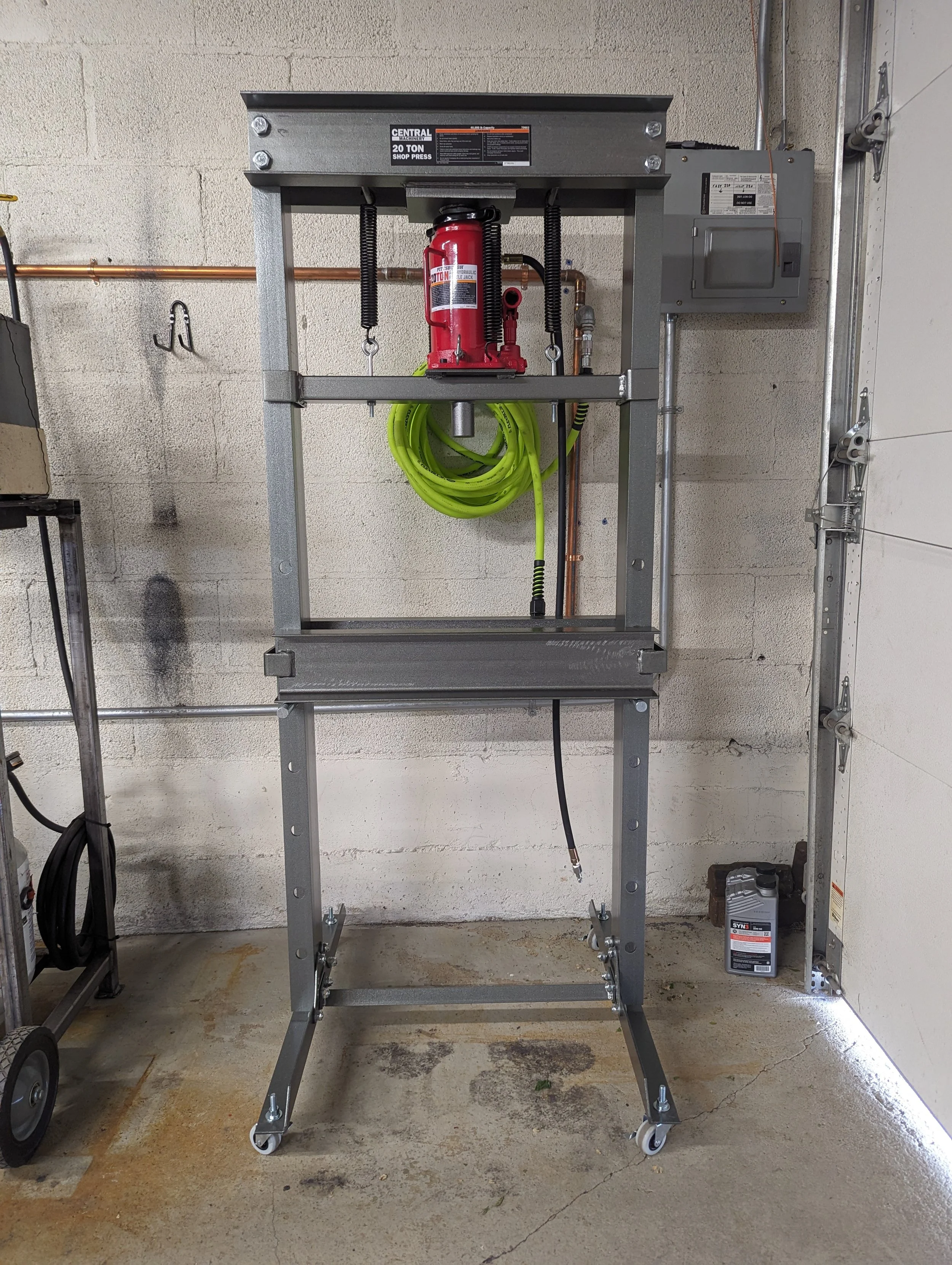Modified hydraulic shop press ready for everyday workshop use.