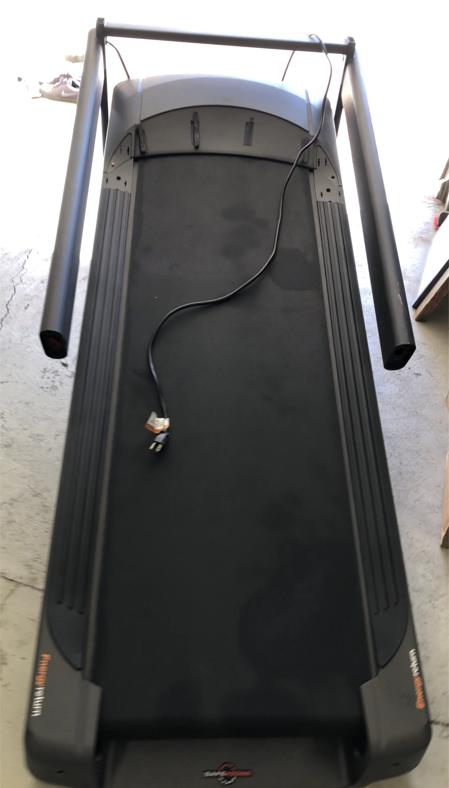 Donor treadmill used as the foundation for the DIY rock tumbler.