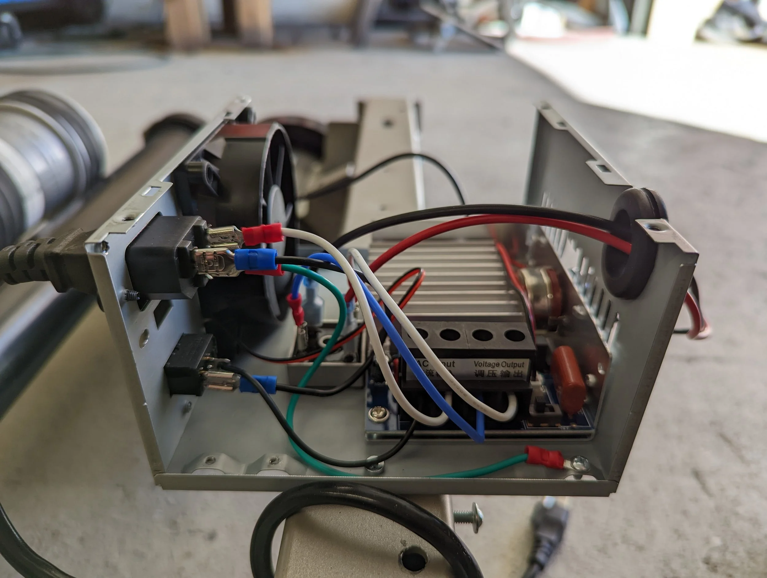 Incoming AC wiring connected inside the modified power supply.
