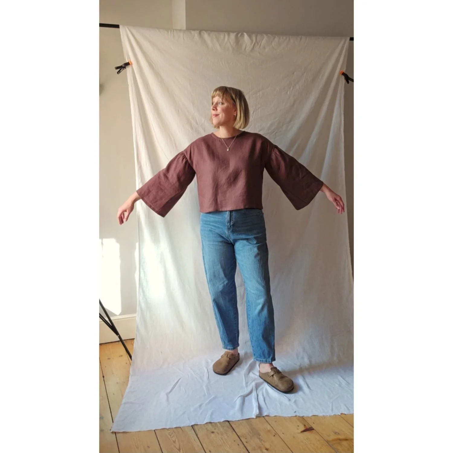 May Top (LS) Oxblood Linen Front Arms up.jpg