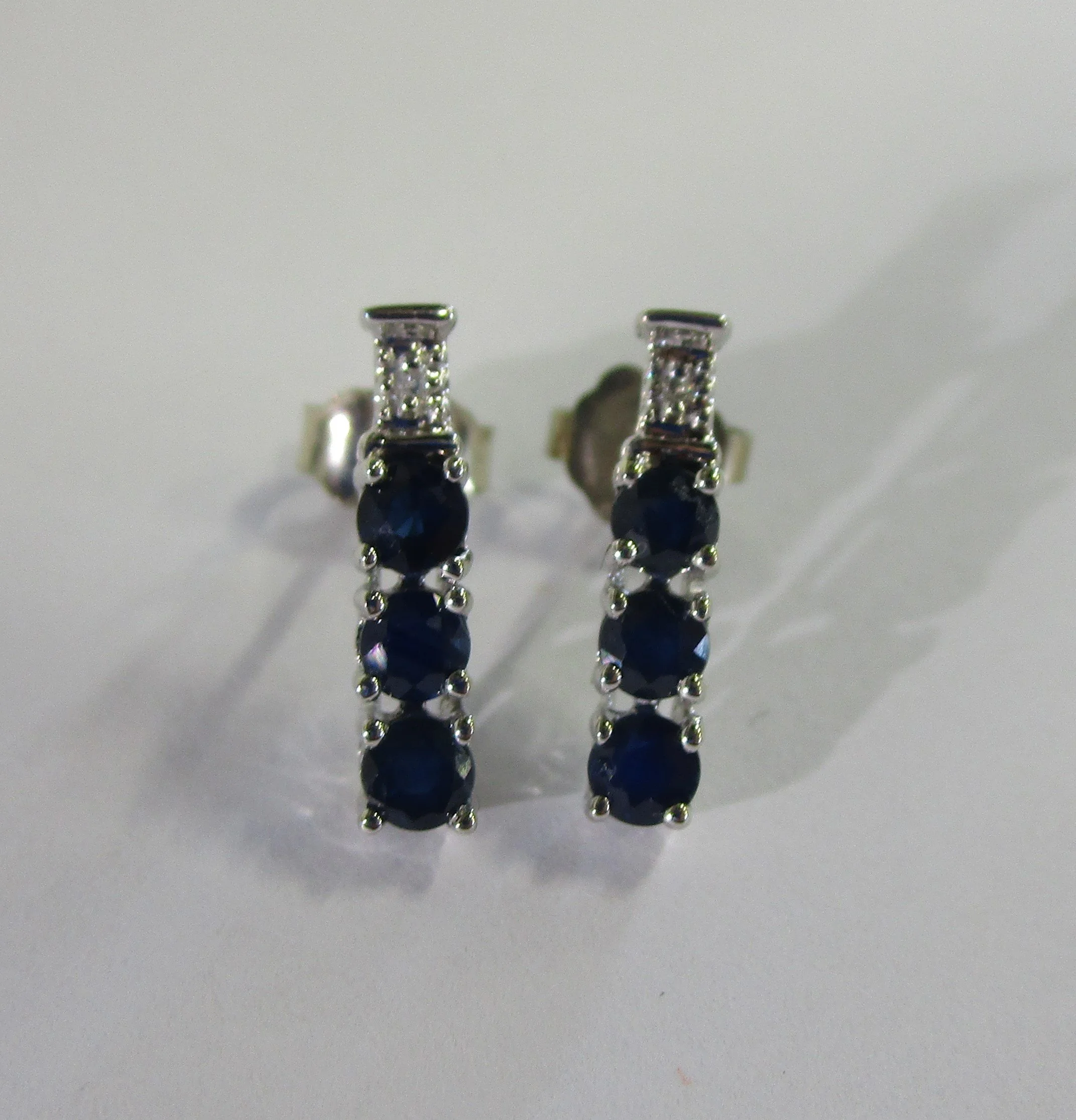 Earrings 10kt White Gold 1.2 GR Sapphire & Diamond Earrings W/ Backs.