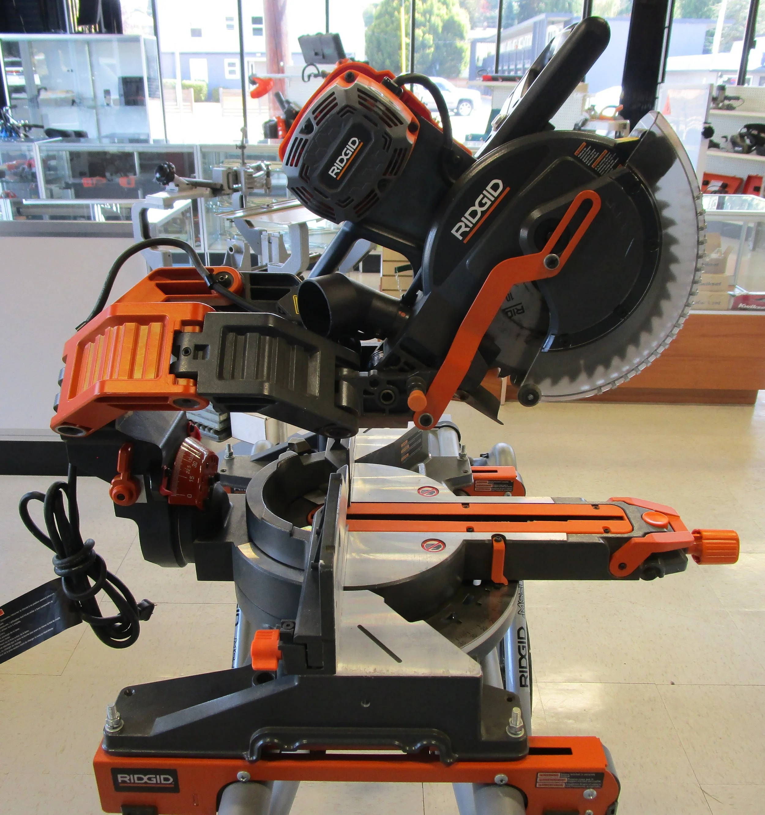 RIDGID R4241 10" Dual Bevel Sliding Miter Saw on Stand.