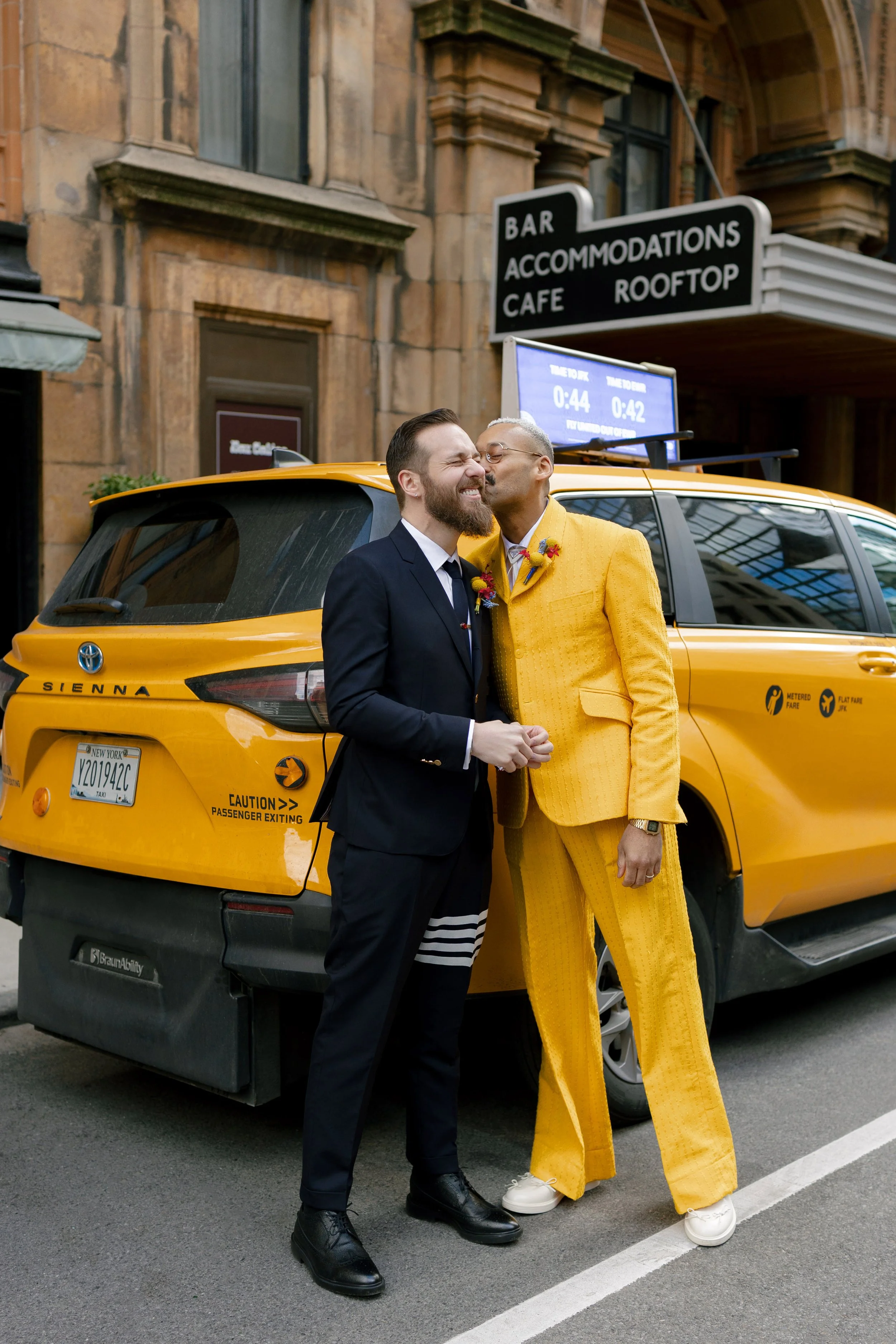 A couple in front of Freehand Hotel NYC gramercy flatiron neighborhood 