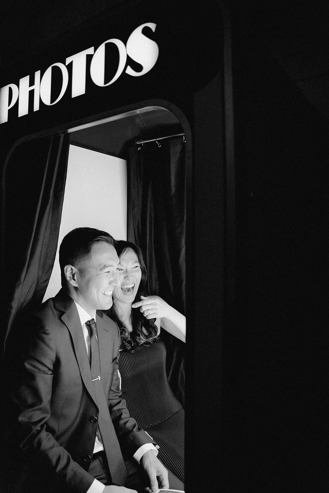 A couple enjoying the photobooth at the Georgia Room in Gramercy