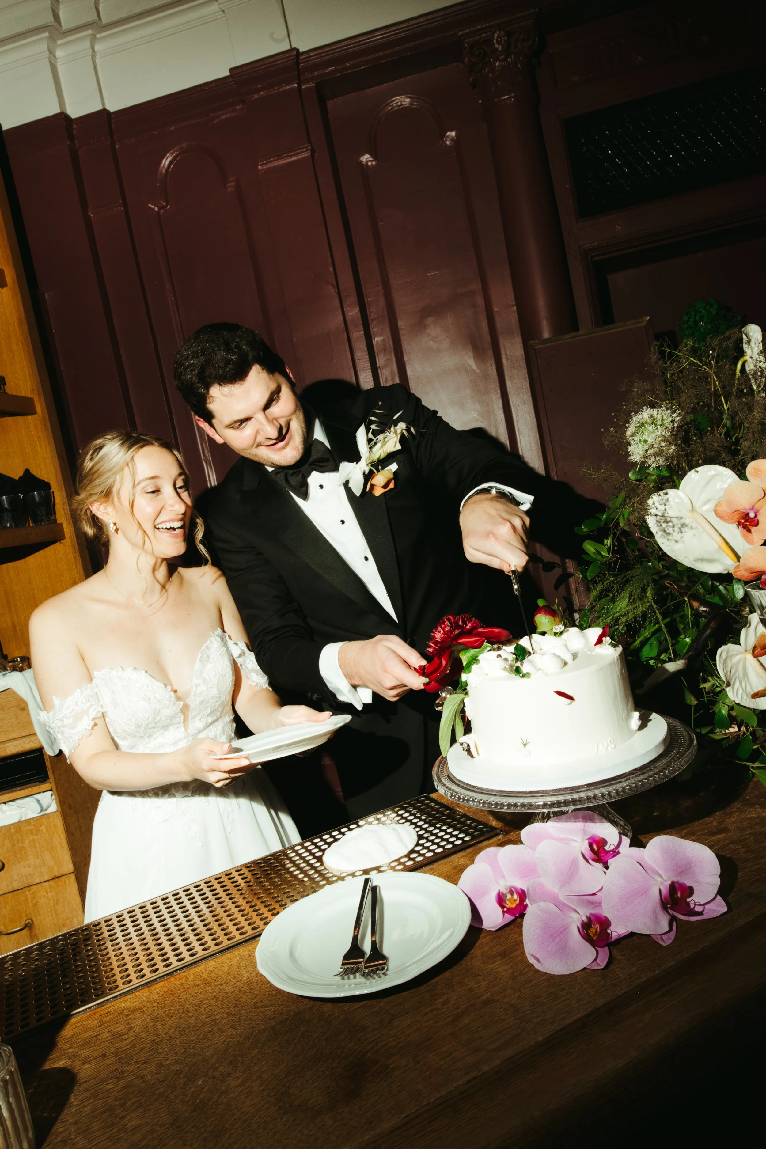 Bride and Groom cake cutting Freehand Hotel Georgia Room Gramercy