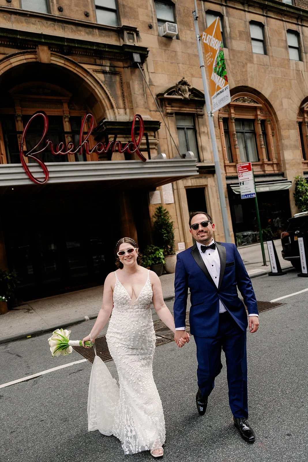 A couple in front of Freehand Hotel NYC gramercy flatiron neighborhood 