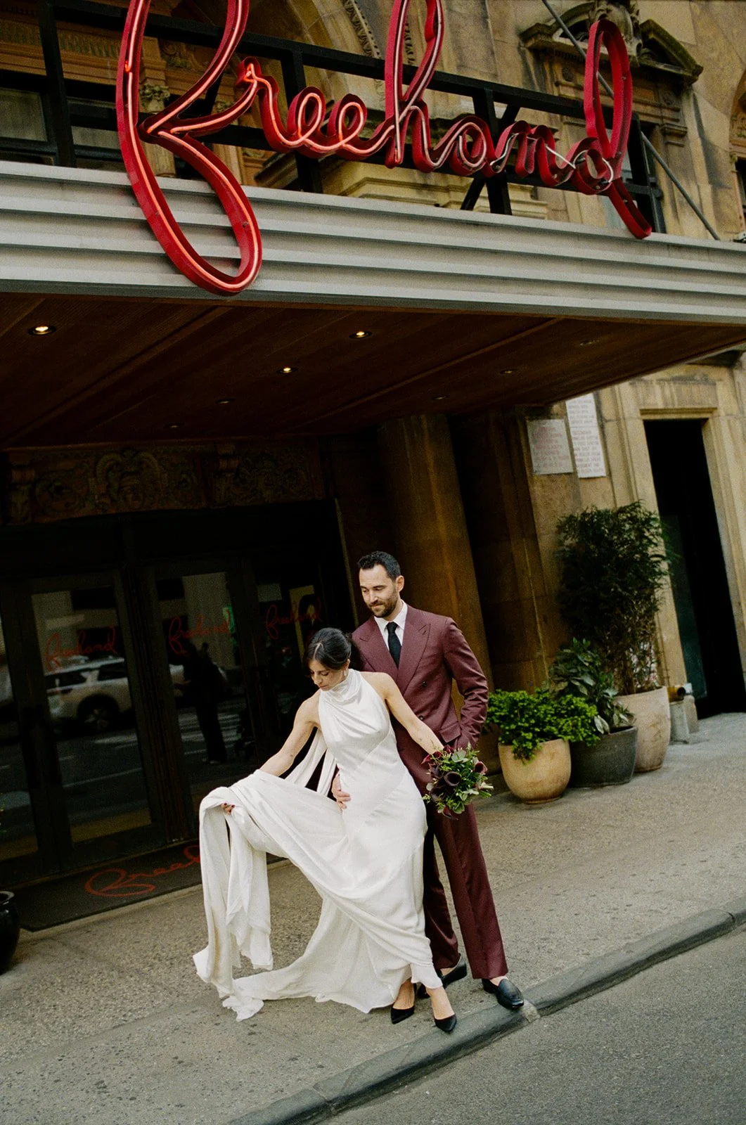 A couple in front of Freehand Hotel NYC gramercy flatiron neighborhood 